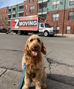 Dog in front of EZ Moving Truck in Denver Colorado