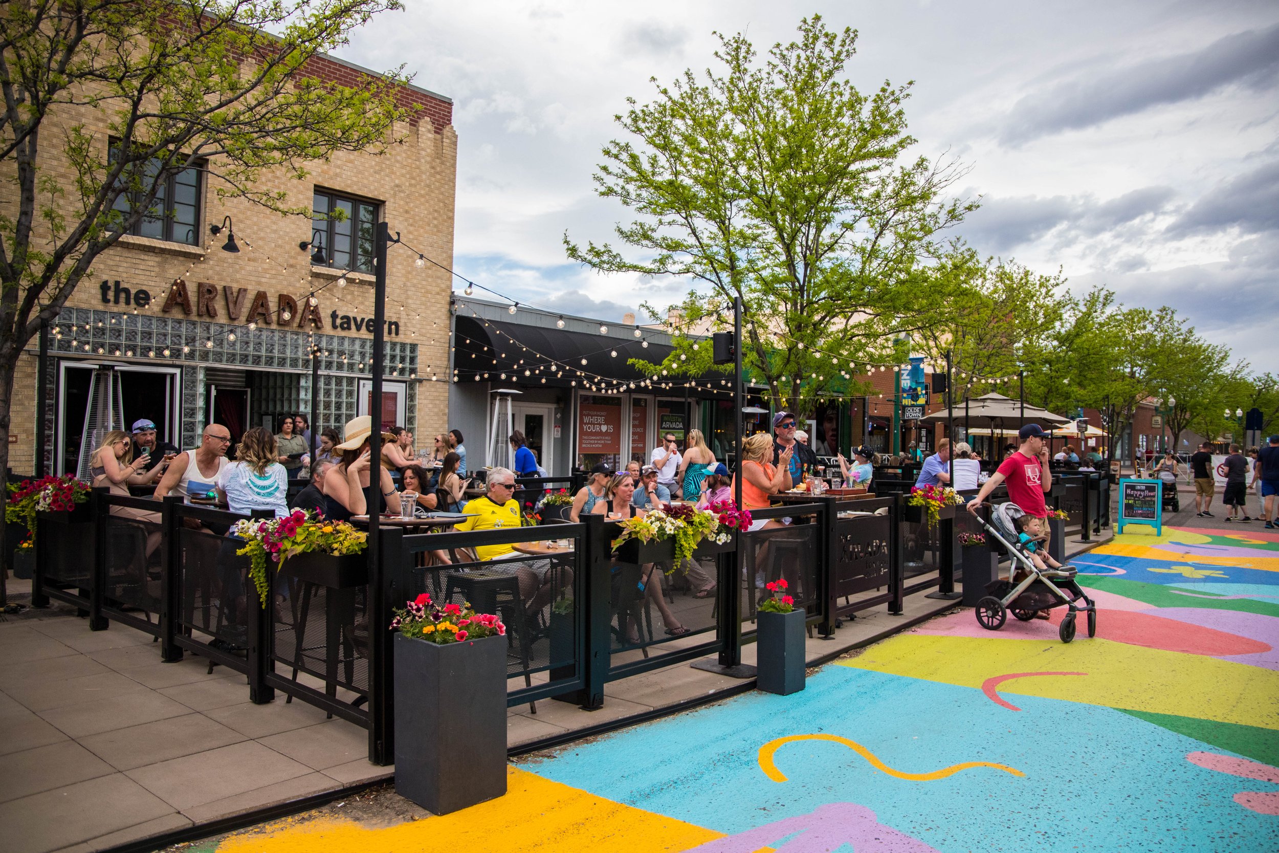 People eating out at a restaurant in Downtown Arvada