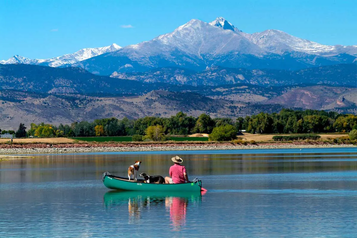 Kayak in Longmont Colorado lake looking at mountains