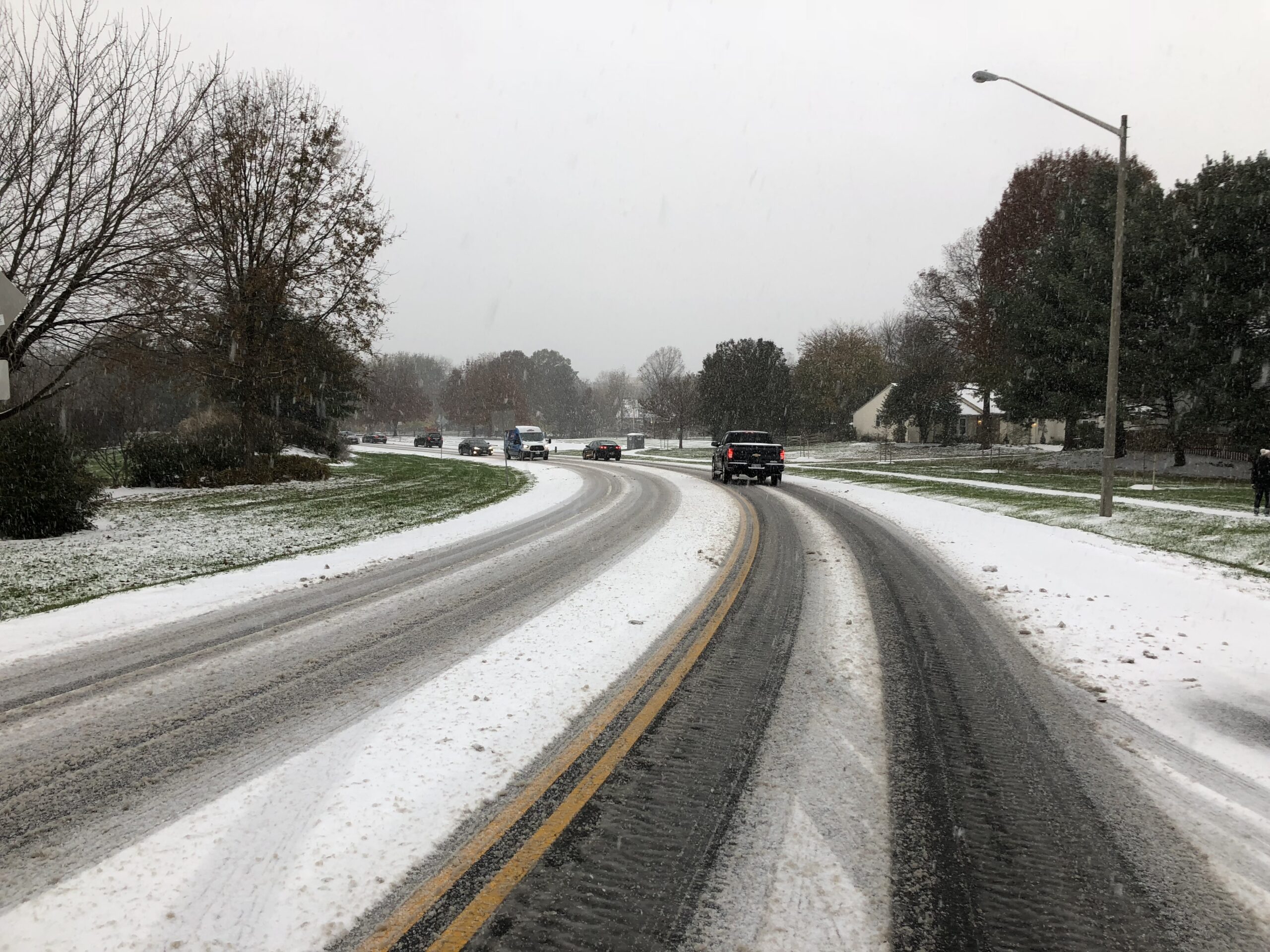 Move in Colorado's Sleet with snow and sleet on the road