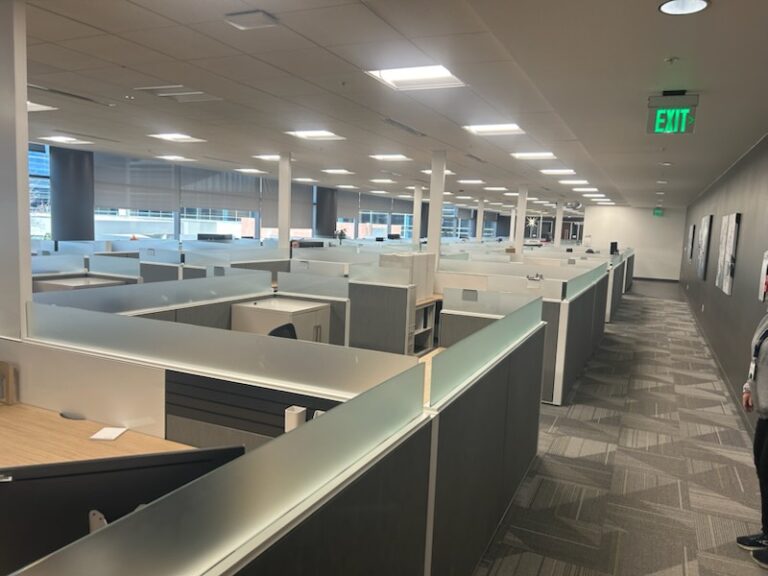 Operational office before EZ Moving begins decommissioning the office furniture